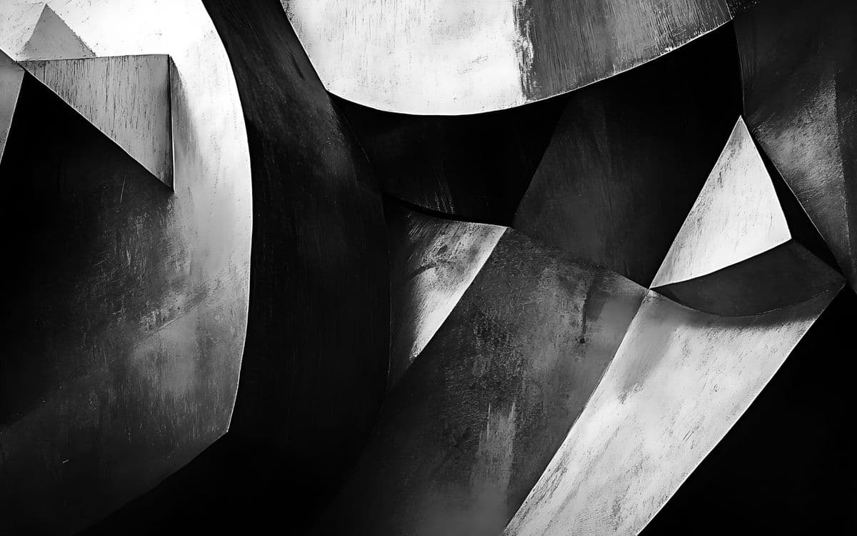 Curved metal surfaces folding into shadow