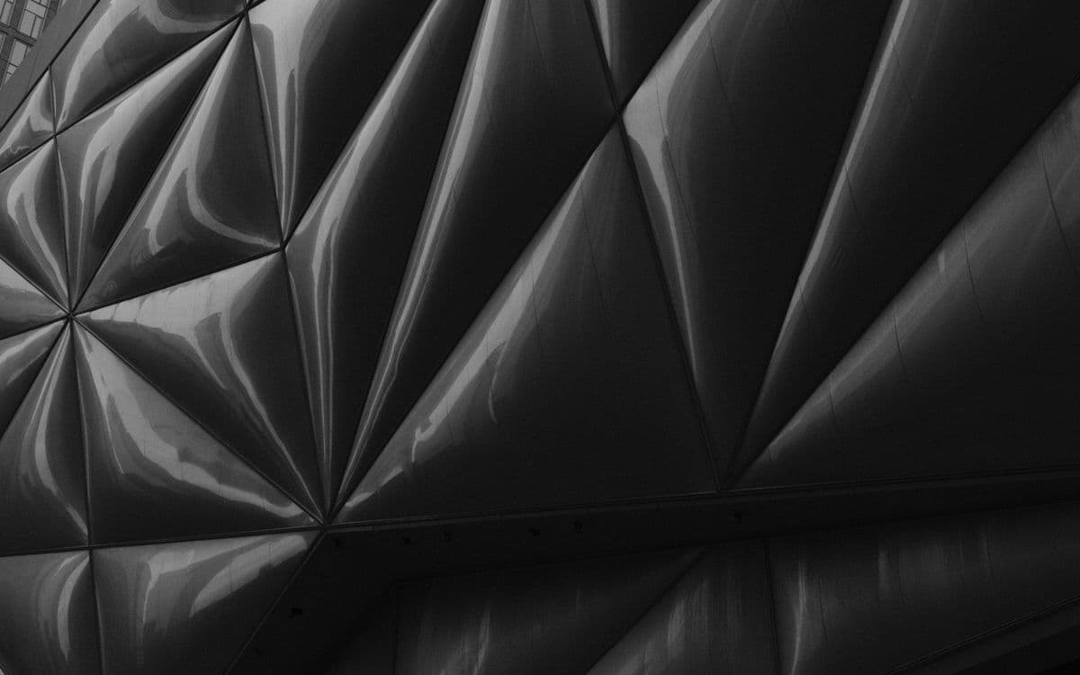 A faceted ceiling of triangular panels