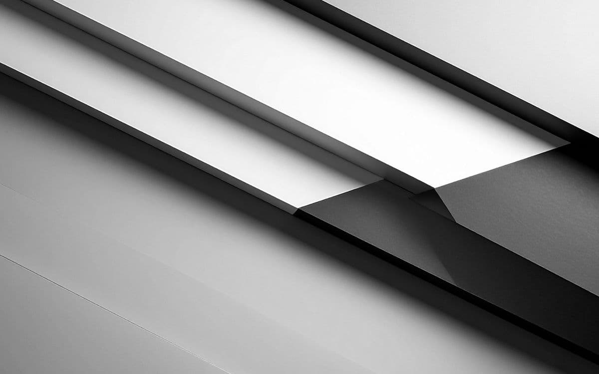 Angled folds of a pale facade